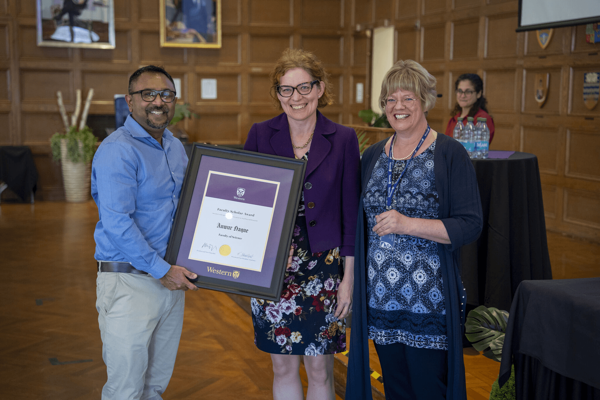 Dr. Haque receiving the Western University's Faculty Scholar Award